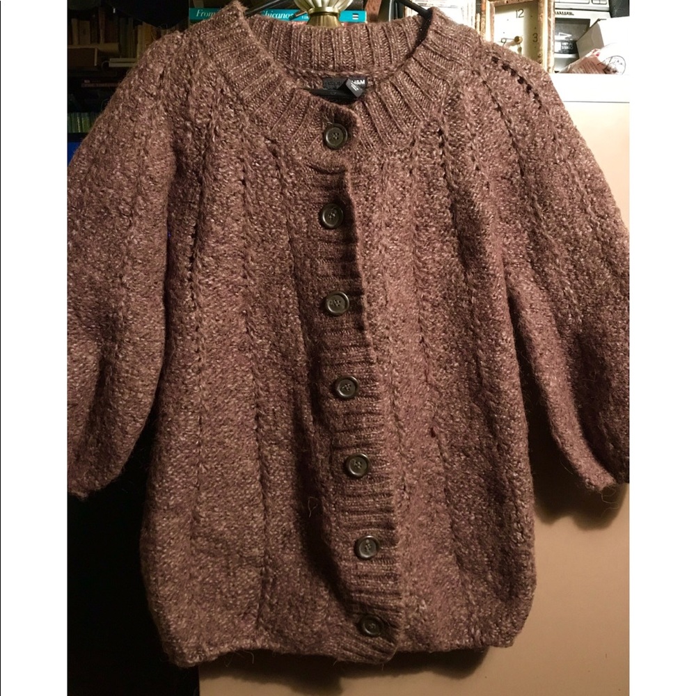 Woolen Brown sweater won’t puffy sleeves.